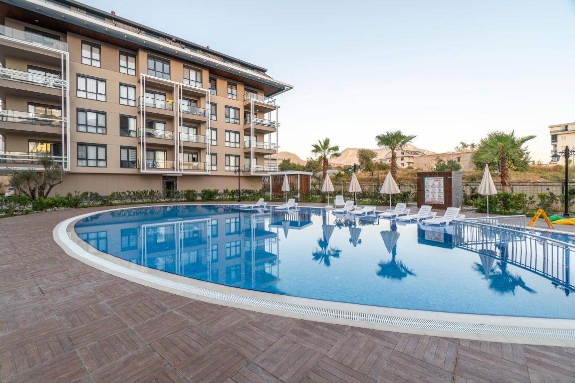 Construction of a modern residential complex in the European region of Oba - Umbrella Group - Photo 11