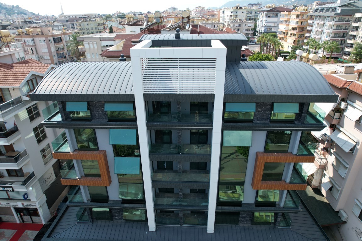 An investment-attractive project in the center of Alanya, just 400 meters from the sea - Umbrella Group - Photo 4