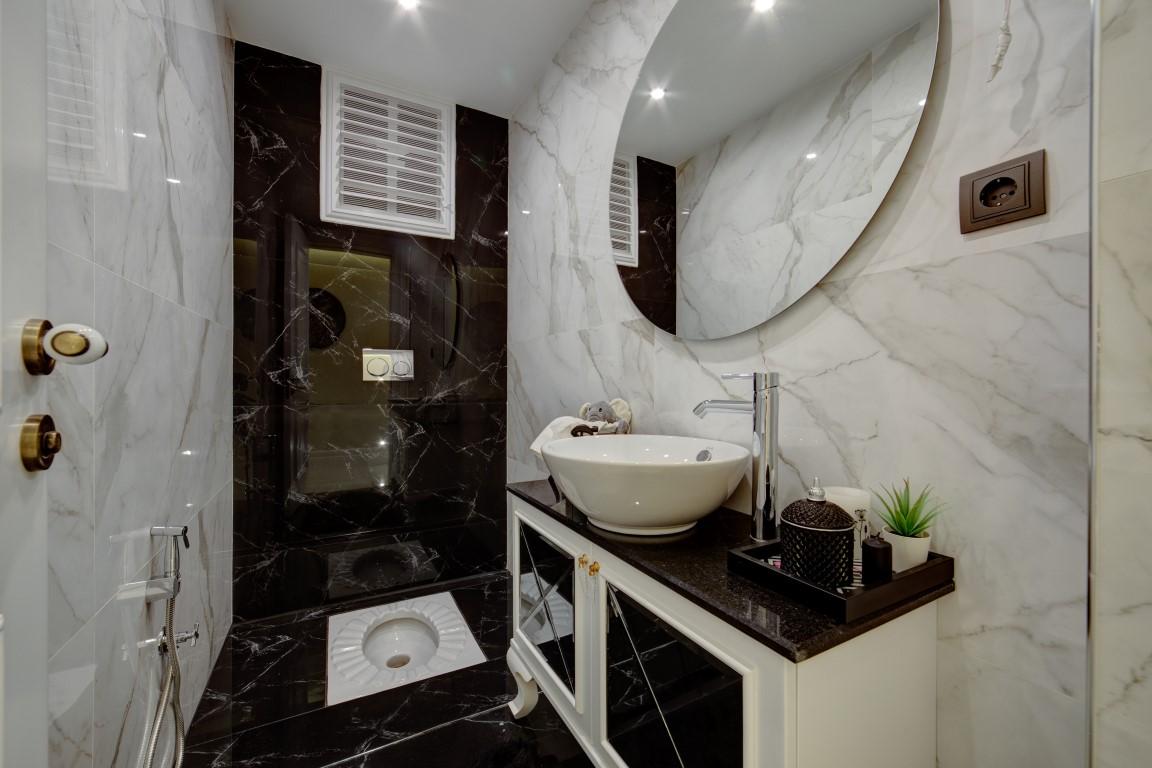 Design of a modern residential complex with spacious layouts in Mersin - Umbrella Group - Photo 29