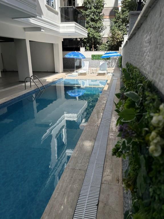 Cosy residential complex with infrastructure in Mahmutlar - Umbrella Group - Photo 9