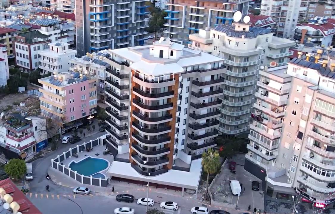 Two bedroom apartment in a new house near the beach of Cleopatra, Alanya - Umbrella Group