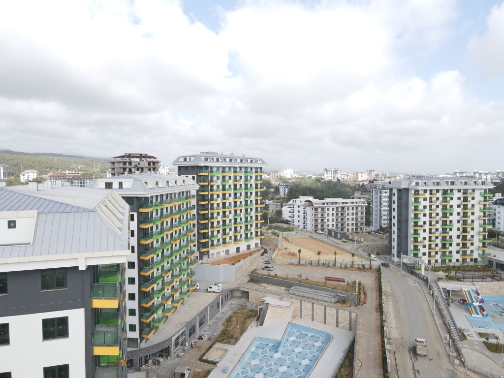 One bedroom apartment in the Mahmutlar area in a complex with various infrastructure - Umbrella Group - Photo 2