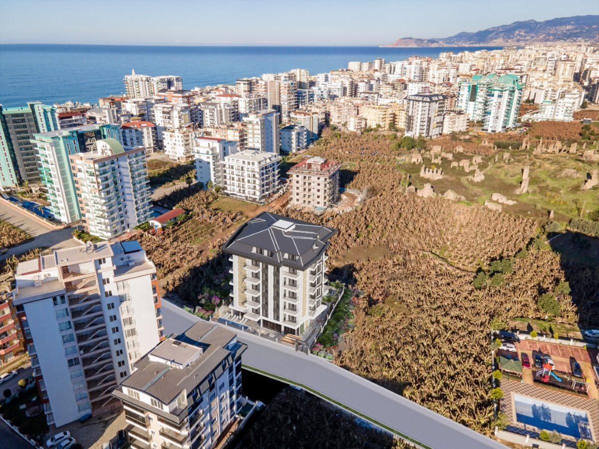 2+1 apartment in the Mahmutlar area near the sea - Umbrella Group - Photo 17