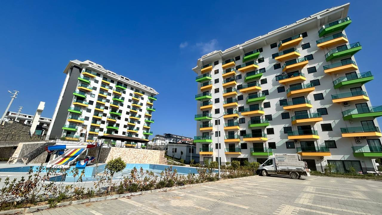One bedroom apartment in the Mahmutlar area in a complex with various infrastructure - Umbrella Group
