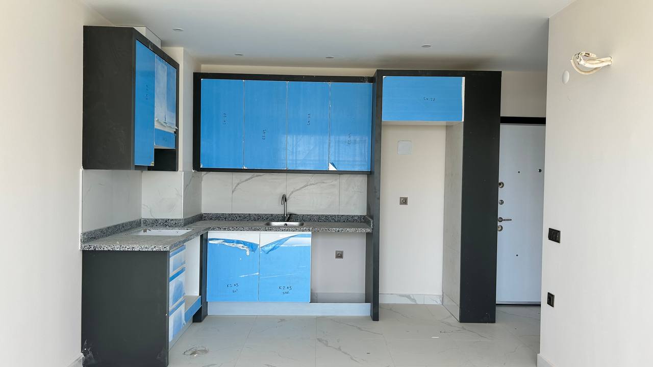 One bedroom apartment in the Mahmutlar area in a complex with various infrastructure - Umbrella Group - Photo 14