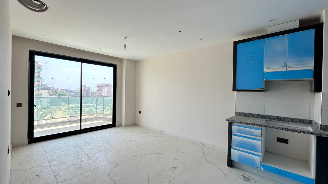 One bedroom apartment in the Mahmutlar area in a complex with various infrastructure - Umbrella Group - Photo 12