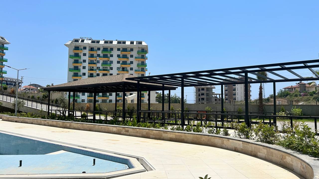 One bedroom apartment in the Mahmutlar area in a complex with various infrastructure - Umbrella Group - Photo 9