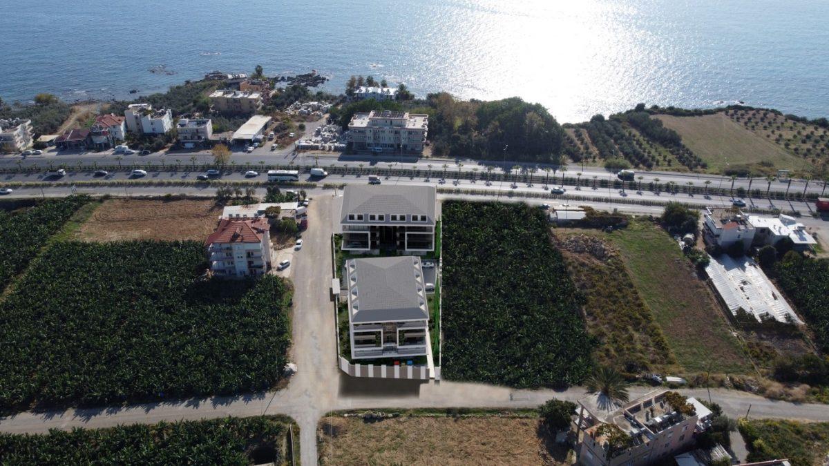 New residential complex with spacious apartments 50 m from the sea, Okudjalar district - Umbrella Group - Photo 2
