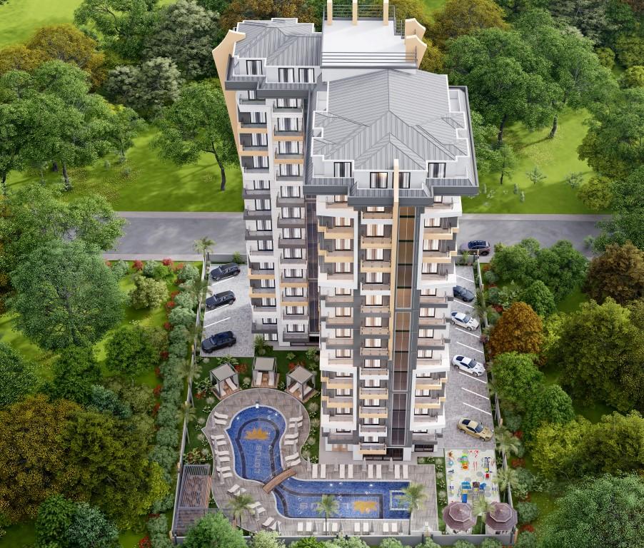 High-rise residential complex with 1+1 and 2+1 apartments in Mahmutlar district - Umbrella Group - Photo 2