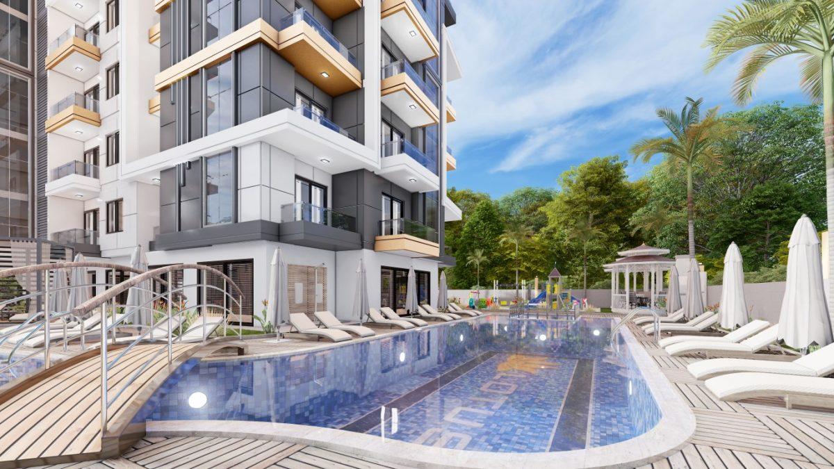 High-rise residential complex with 1+1 and 2+1 apartments in Mahmutlar district - Umbrella Group - Photo 9