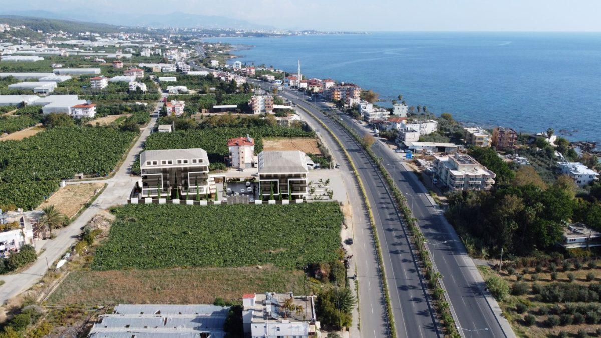 New residential complex with spacious apartments 50 m from the sea, Okudjalar district - Umbrella Group - Photo 3