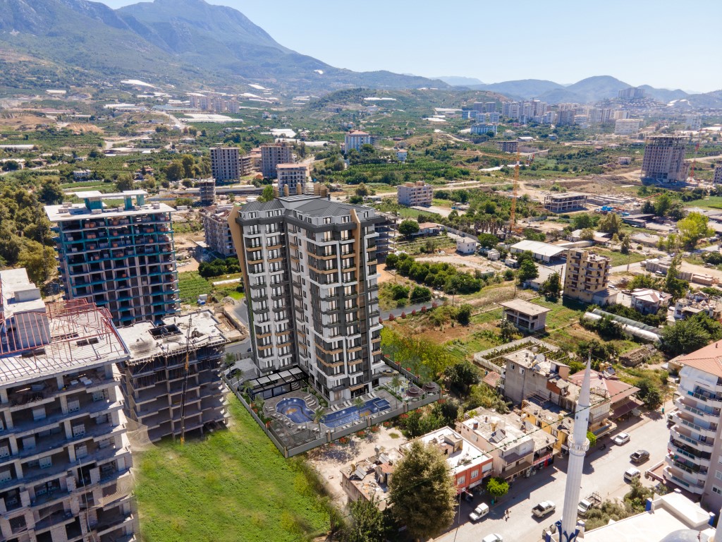 High-rise residential complex with 1+1 and 2+1 apartments in Mahmutlar district - Umbrella Group - Photo 4