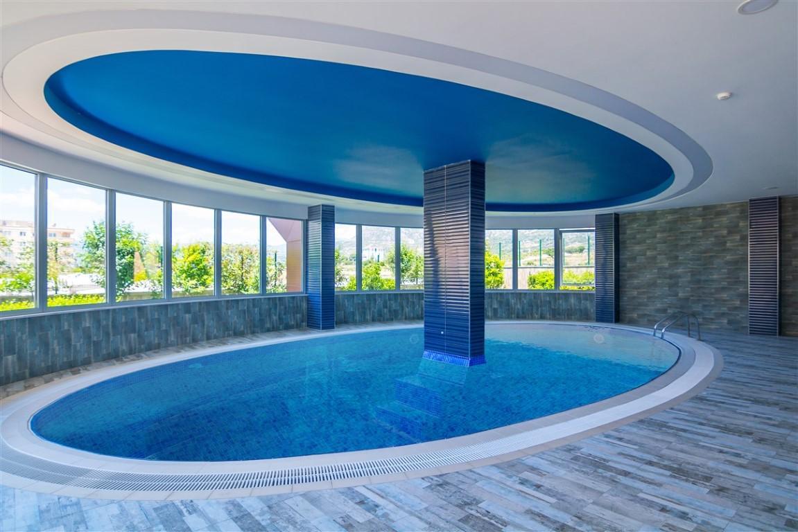 Four bedroom apartment of 142 m2 in Mahmutlar district - Umbrella Group - Photo 50