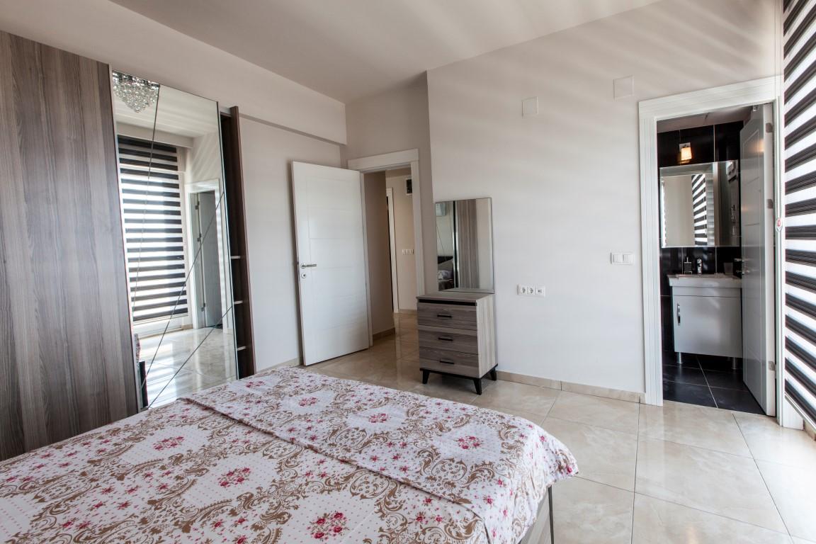 New cozy residential development near the sea in the Erdemley area, with 1+1 and 2+1 apartments - Umbrella Group - Photo 45