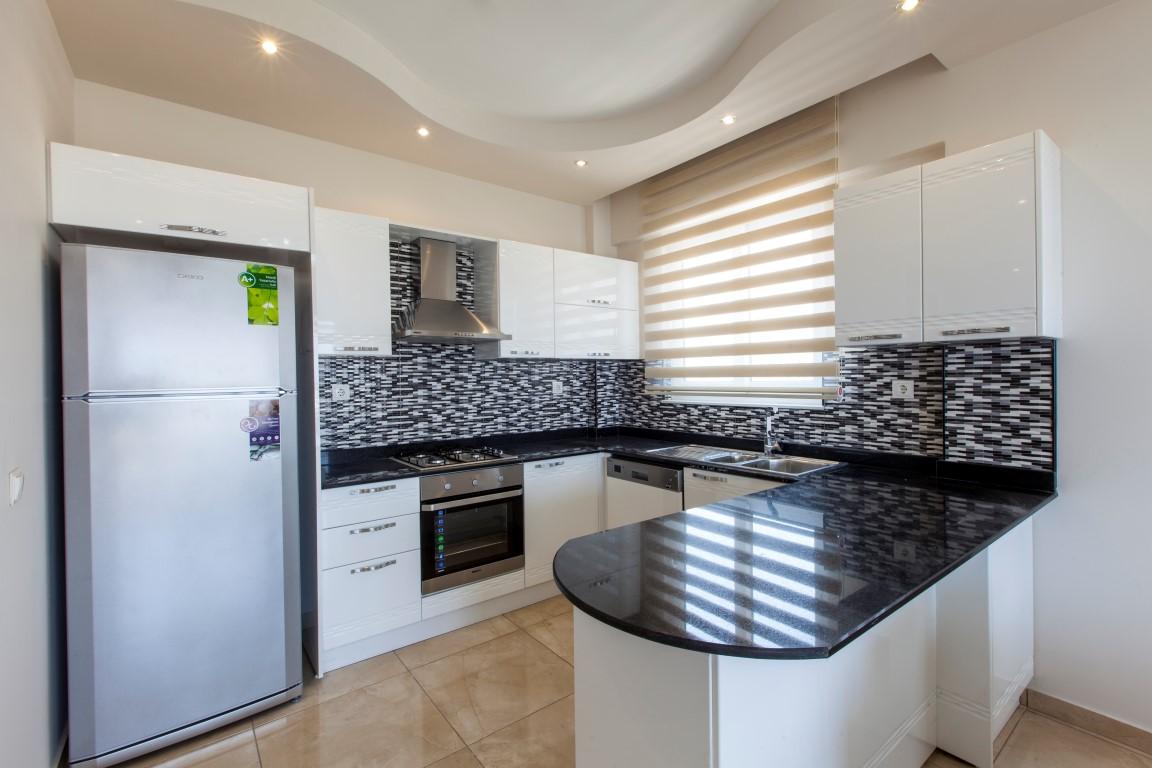 New cozy residential development near the sea in the Erdemley area, with 1+1 and 2+1 apartments - Umbrella Group - Photo 43