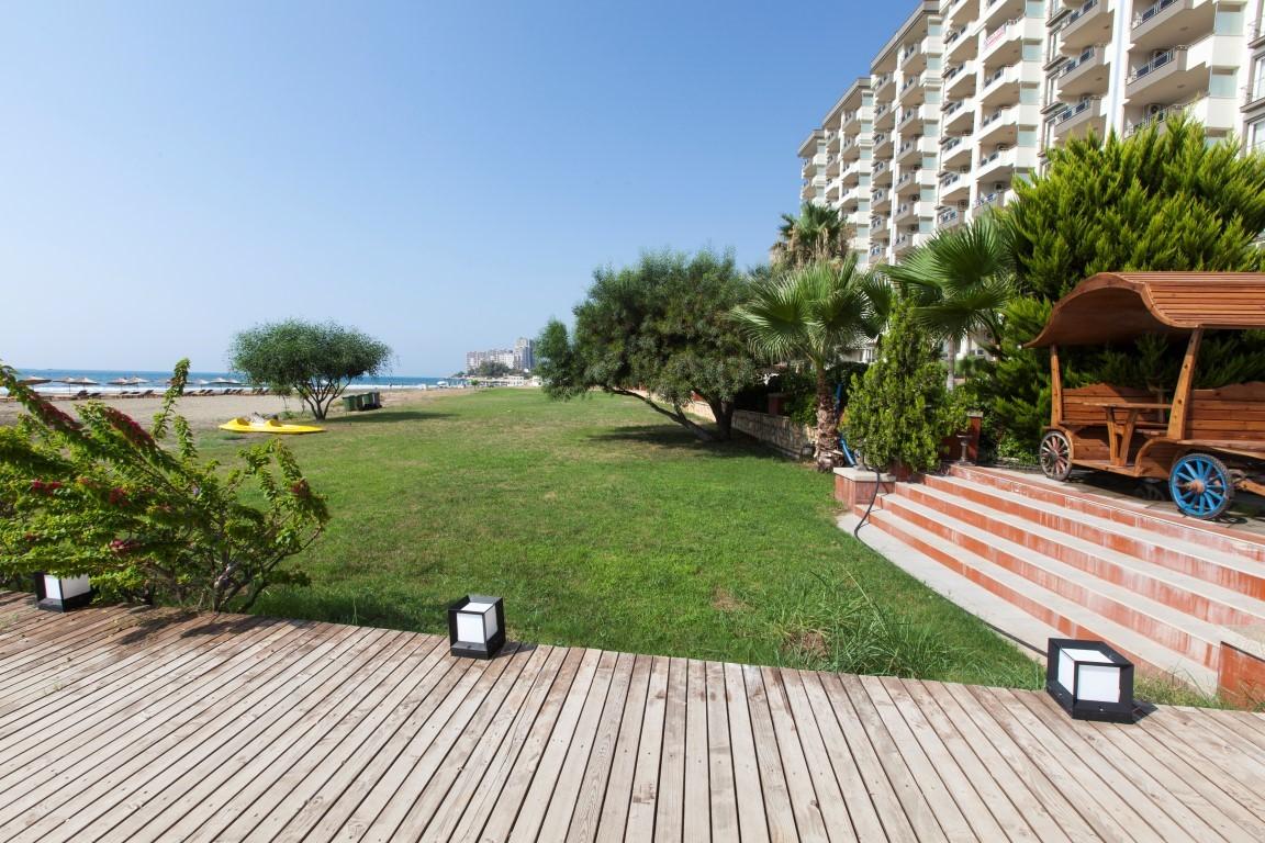 New cozy residential development near the sea in the Erdemley area, with 1+1 and 2+1 apartments - Umbrella Group - Photo 17