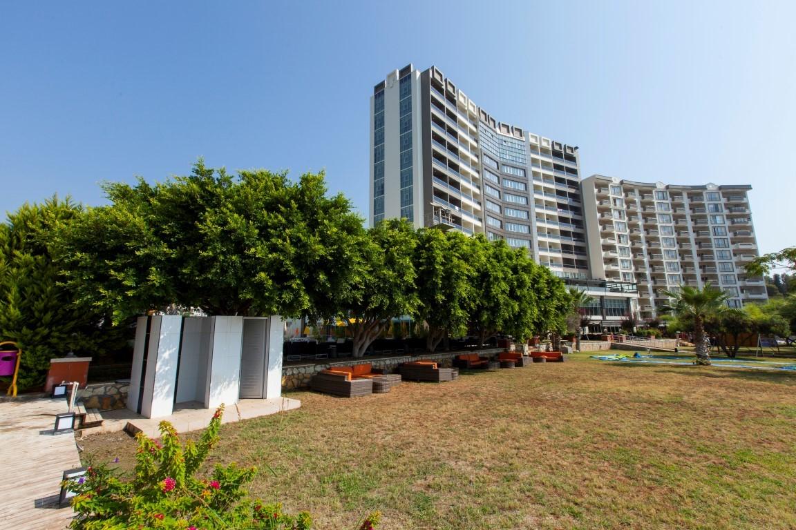 New cozy residential development near the sea in the Erdemley area, with 1+1 and 2+1 apartments - Umbrella Group - Photo 16