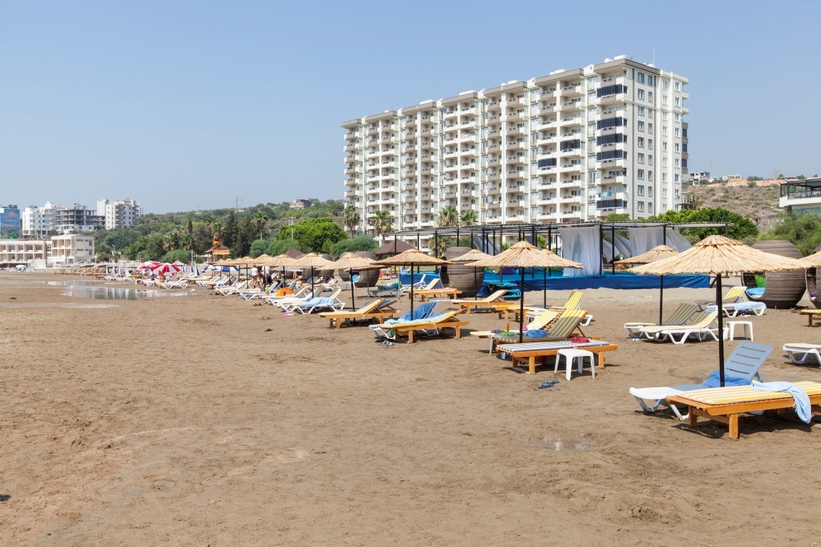 New cozy residential development near the sea in the Erdemley area, with 1+1 and 2+1 apartments - Umbrella Group - Photo 12