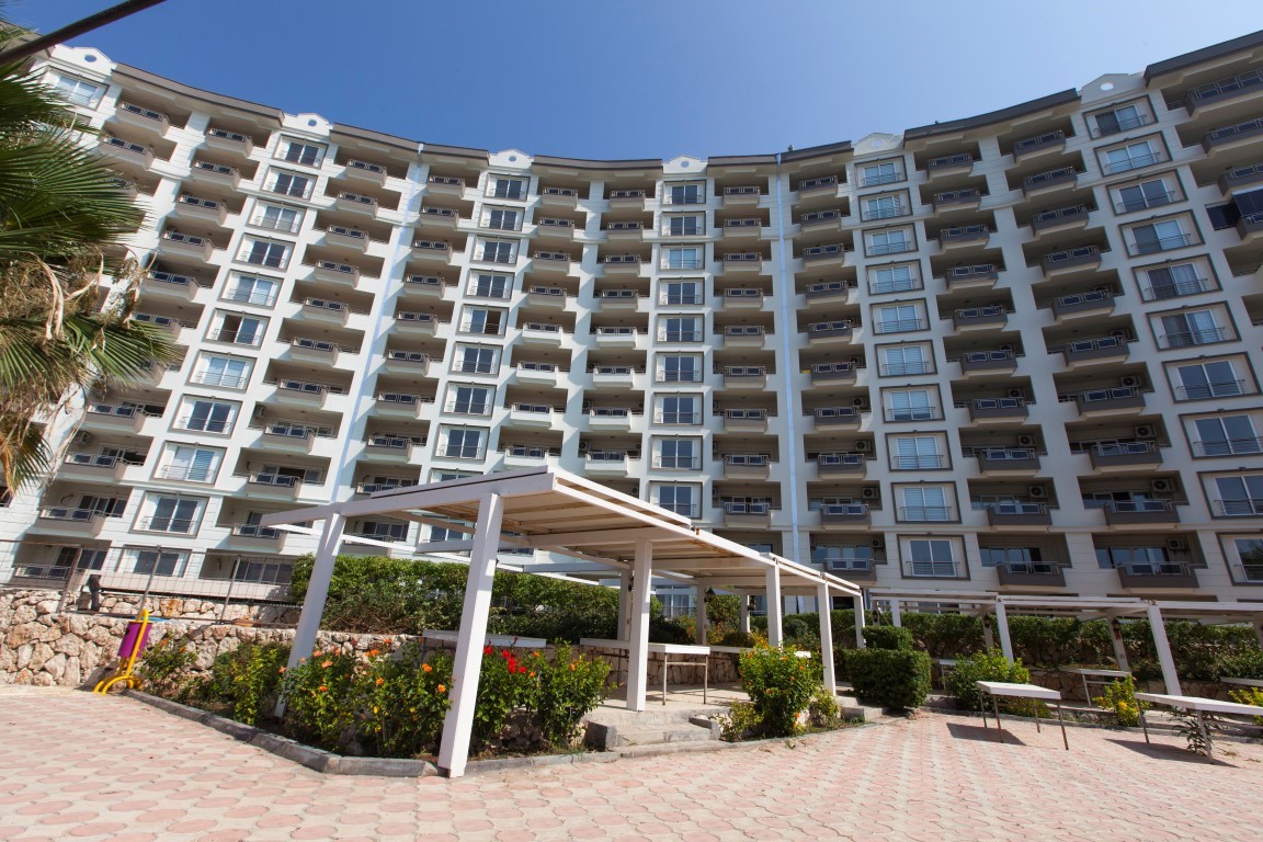 New cozy residential development near the sea in the Erdemley area, with 1+1 and 2+1 apartments - Umbrella Group - Photo 19