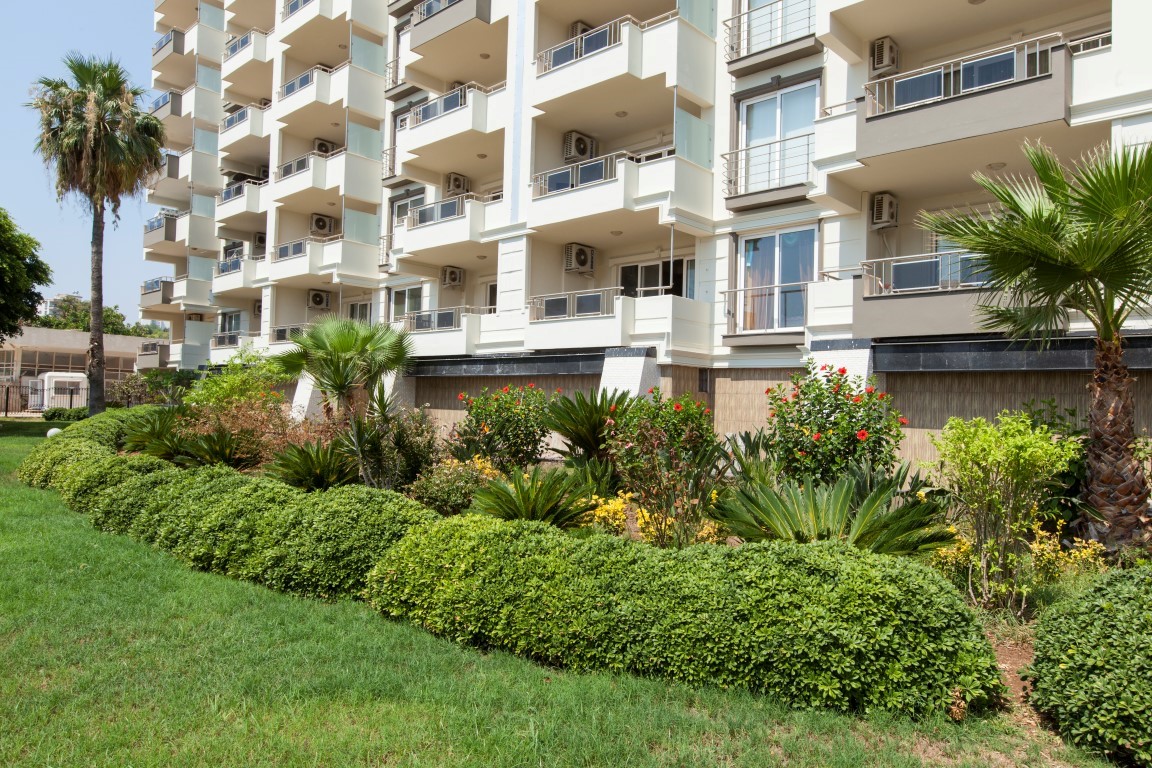 New cozy residential development near the sea in the Erdemley area, with 1+1 and 2+1 apartments - Umbrella Group - Photo 25