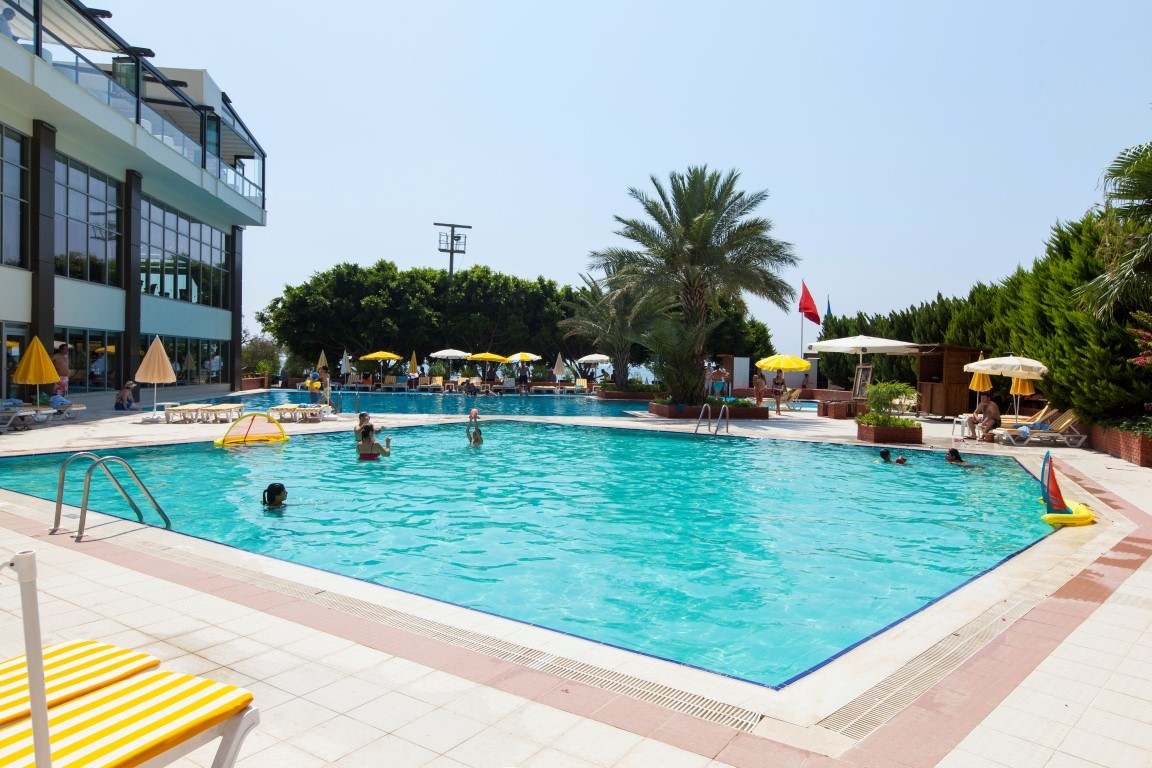 New cozy residential development near the sea in the Erdemley area, with 1+1 and 2+1 apartments - Umbrella Group - Photo 30