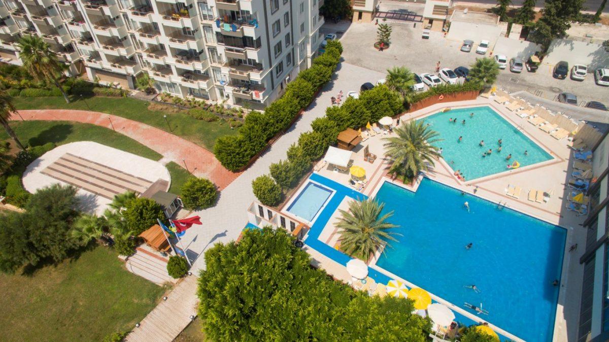New cozy residential development near the sea in the Erdemley area, with 1+1 and 2+1 apartments - Umbrella Group - Photo 26