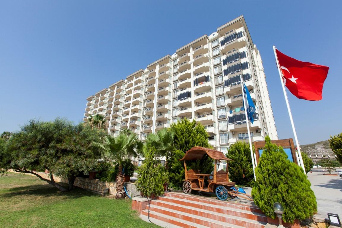 New cozy residential development near the sea in the Erdemley area, with 1+1 and 2+1 apartments - Umbrella Group - Photo 18