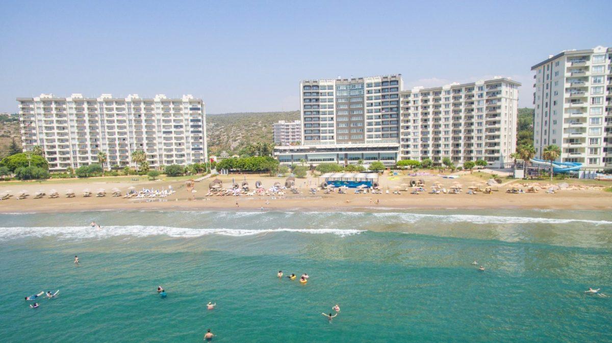 New cozy residential development near the sea in the Erdemley area, with 1+1 and 2+1 apartments - Umbrella Group - Photo 8