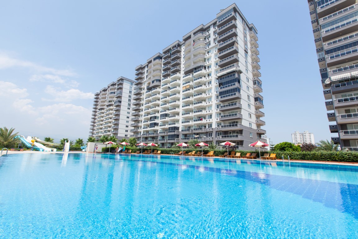 Ready-made residential complex with spacious apartments on the first coastline, Mersin - Umbrella Group - Photo 11