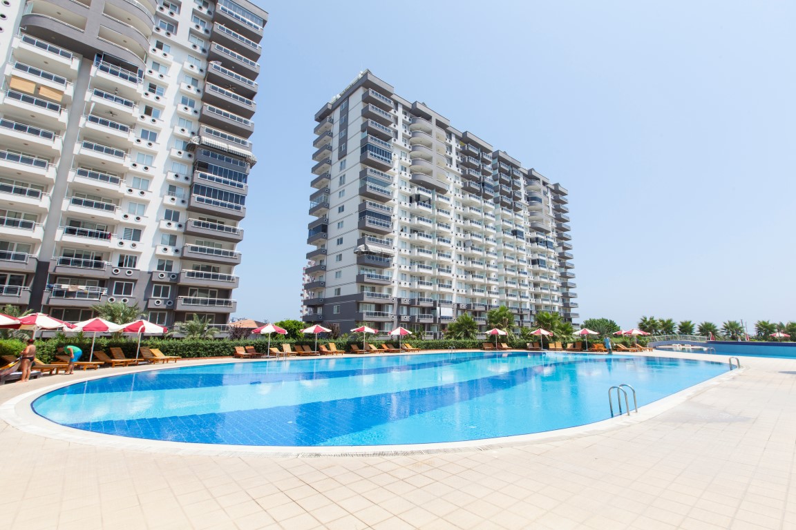 Ready-made residential complex with spacious apartments on the first coastline, Mersin - Umbrella Group - Photo 12