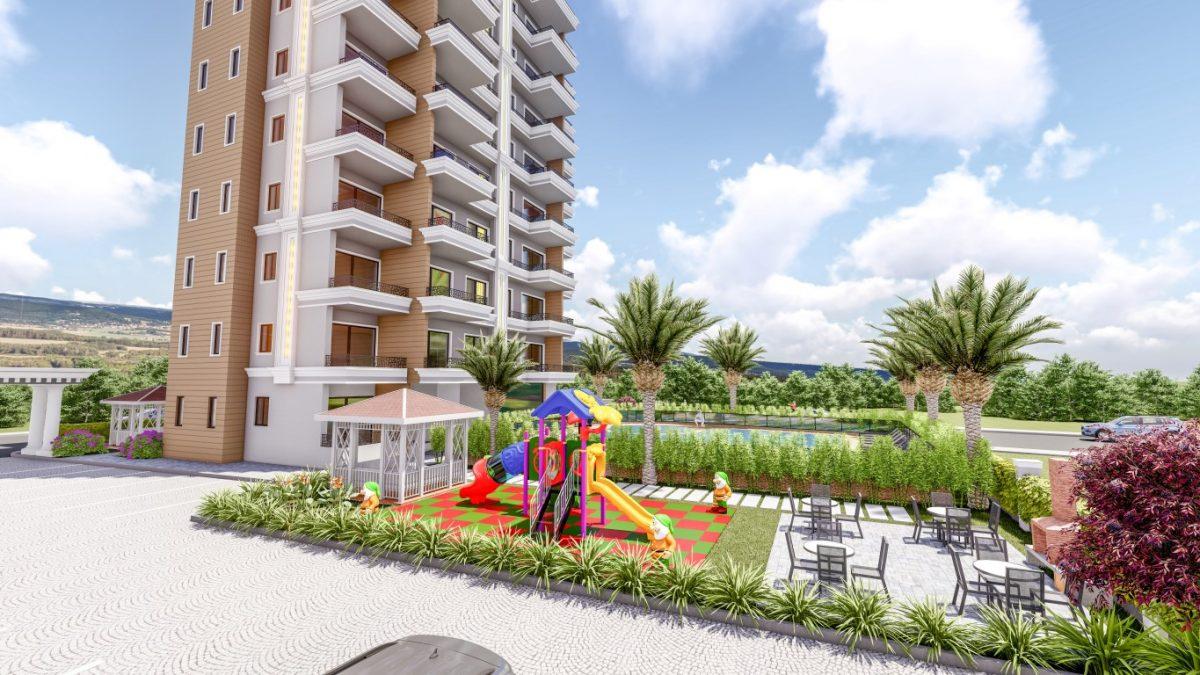 High-rise complex overlooking the sea and the city in the area of Tomyuk, Mersin - Umbrella Group - Photo 9