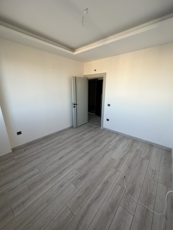 High-rise residential complex with 1+1 and 2+1 apartments in Mersin - Umbrella Group - Photo 17