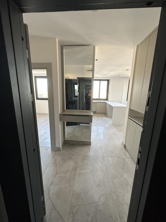 High-rise residential complex with 1+1 and 2+1 apartments in Mersin - Umbrella Group - Photo 11
