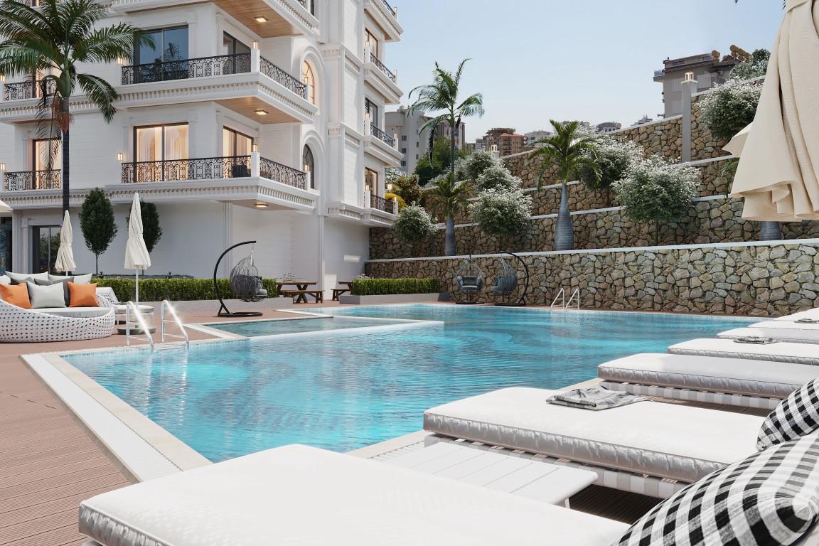 New residential complex in the area of Tosmur, 550 m from the sea - Umbrella Group - Photo 11