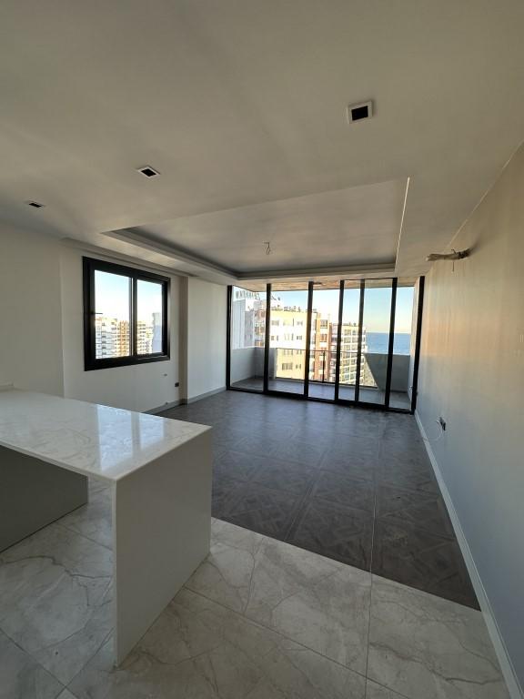 High-rise residential complex with 1+1 and 2+1 apartments in Mersin - Umbrella Group - Photo 9