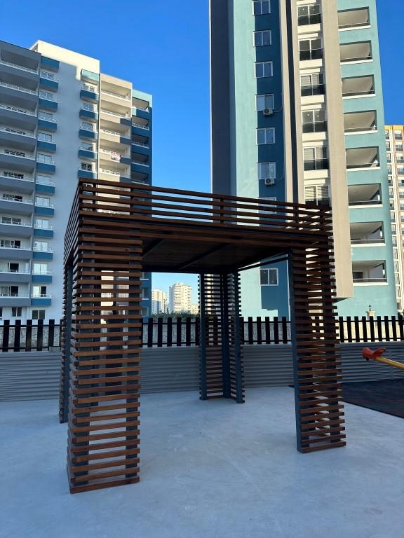 High-rise residential complex with 1+1 and 2+1 apartments in Mersin - Umbrella Group - Photo 6