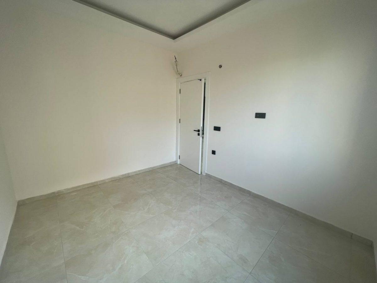 1+1 apartment in Mahmutlar district - Umbrella Group - Photo 26