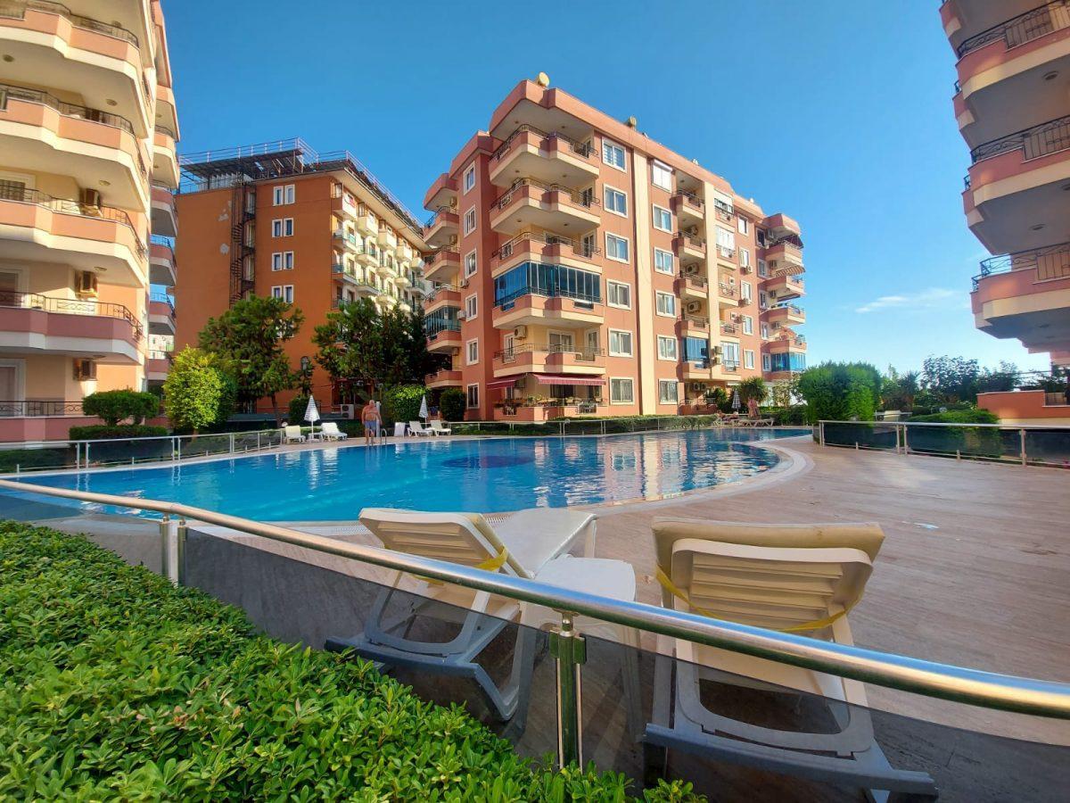Apartment planning 2+1 on the first coastline in Mahmutlar - Umbrella Group - Photo 2