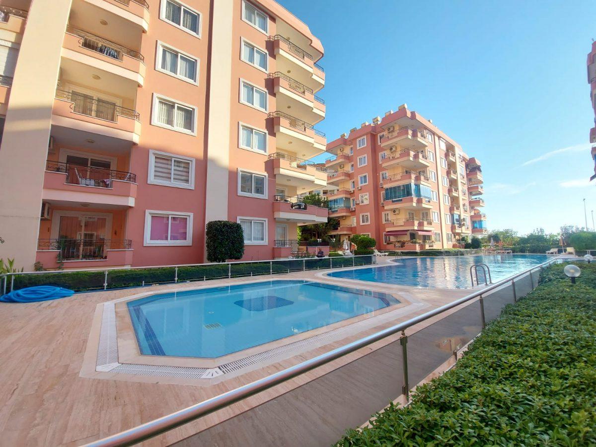Apartment planning 2+1 on the first coastline in Mahmutlar - Umbrella Group - Photo 3