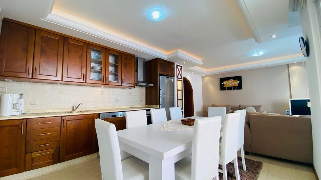 Apartment planning 2+1 on the first coastline in Mahmutlar - Umbrella Group - Photo 11