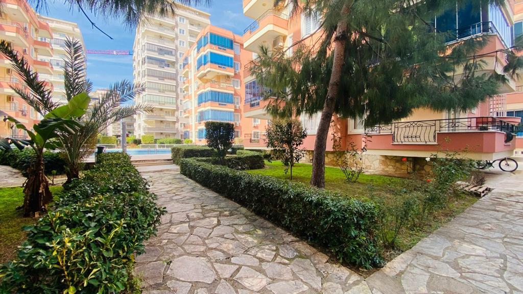 Apartment planning 2+1 on the first coastline in Mahmutlar - Umbrella Group - Photo 6