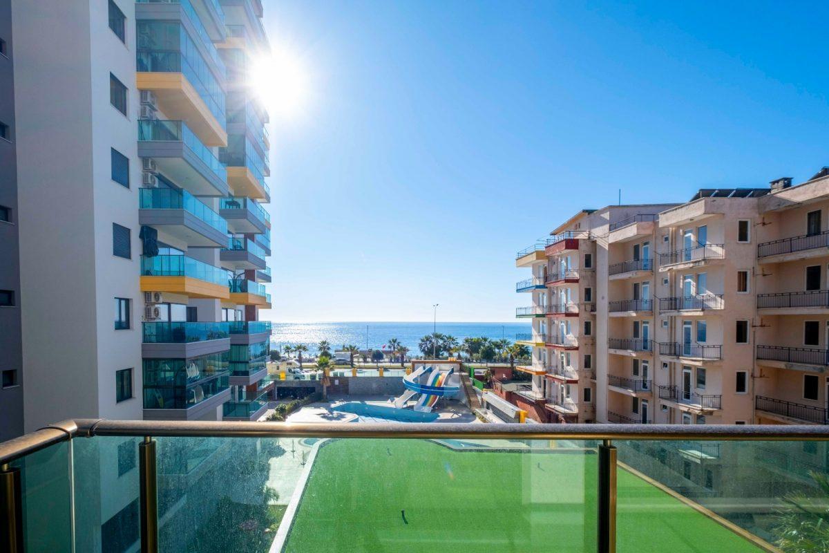 Apartment planning 2+1 on the first coastline in the area of Mahmutlar - Umbrella Group - Photo 24