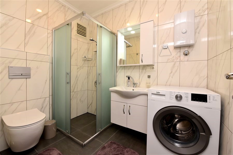 Spacious three bedroom apartment in the center of Alanya, 750 m from the beach - Umbrella Group - Photo 8