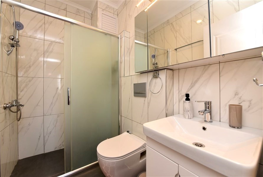 Spacious three bedroom apartment in the center of Alanya, 750 m from the beach - Umbrella Group - Photo 12