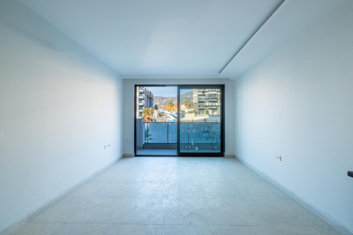 Spacious 1+1 apartment in Alanya, 800 m from the beach and with luxurious infrastructure - Umbrella Group - Photo 12