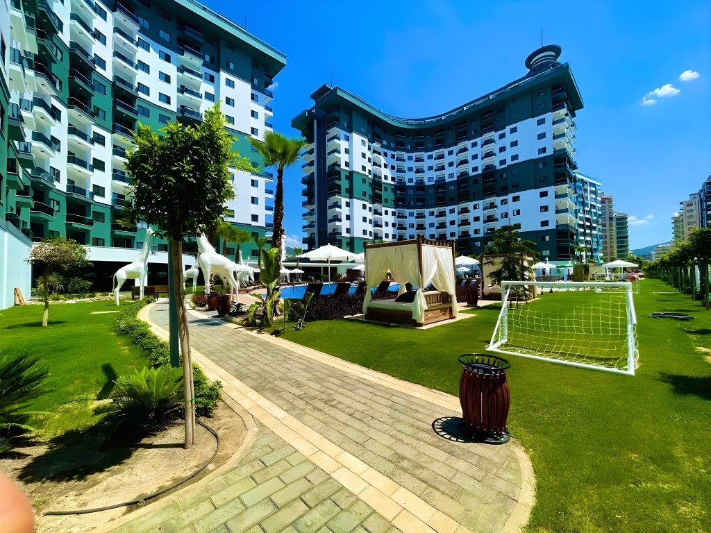 Two-room apartment of 55 m2 in complex with hotel infrastructure, Mahmutlar - Umbrella Group - Photo 2