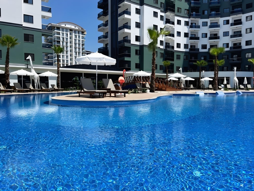Two-room apartment of 55 m2 in complex with hotel infrastructure, Mahmutlar - Umbrella Group - Photo 4