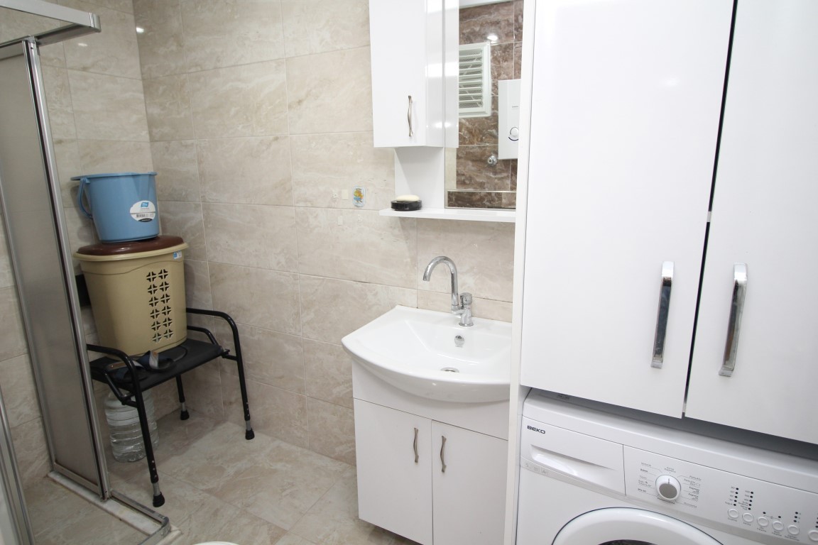 Apartment 115 m2 2+1 with pool in the district of Tosmur - Umbrella Group - Photo 11