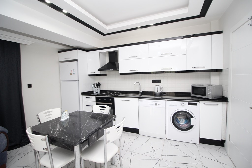 2+1 Apartment in the center of Alanya with rooftop relaxation area - Umbrella Group - Photo 4