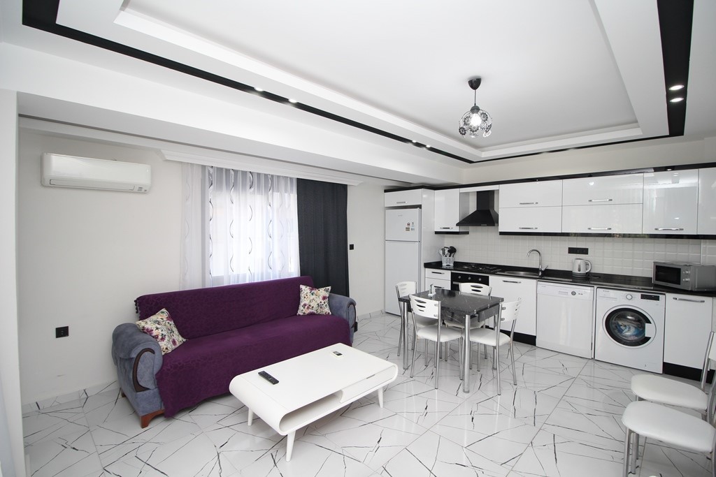2+1 Apartment in the center of Alanya with rooftop relaxation area - Umbrella Group - Photo 3